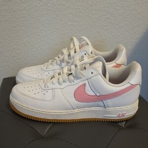Nike White and Pink Sneakers Classic Low-Top Design